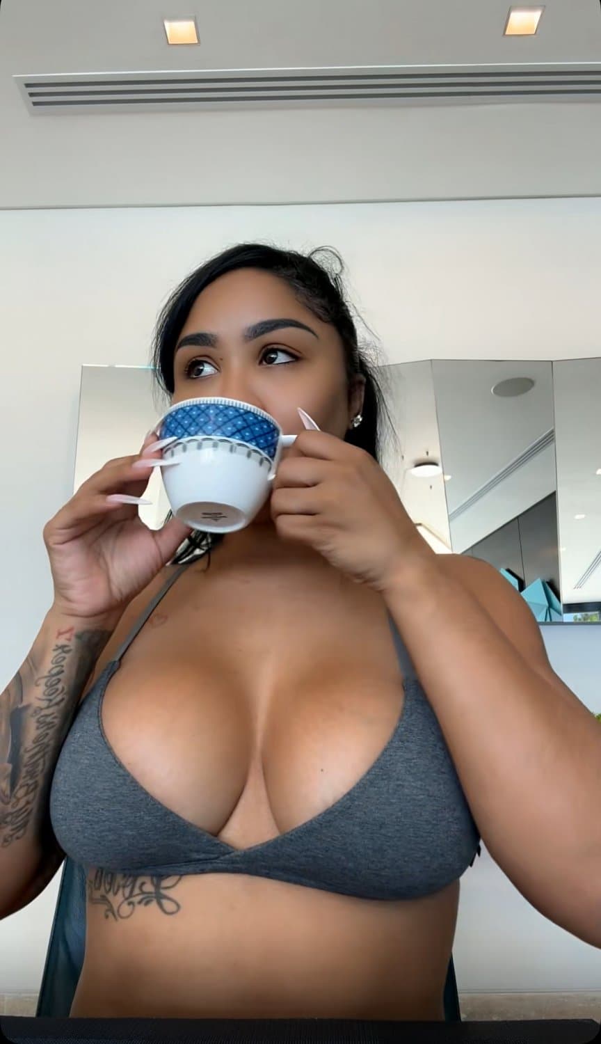 ari fletcher tits busting out bikinis