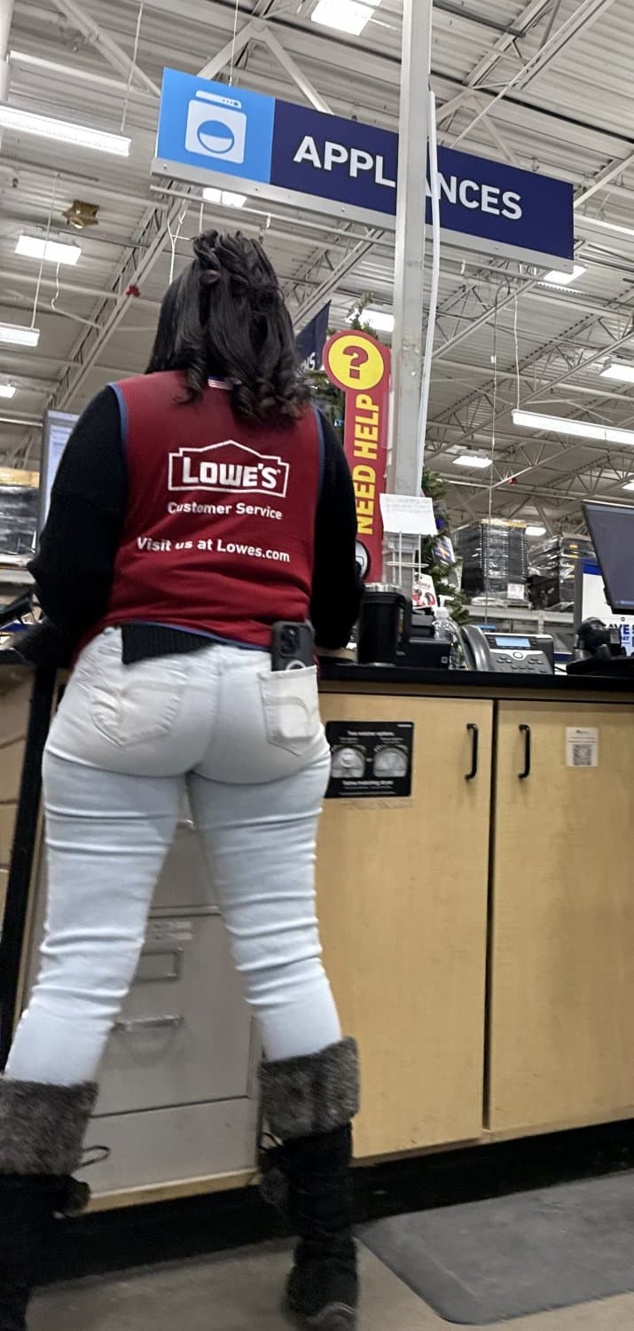Sexy Jamaican milf worker shows off huge ass in tight jeans