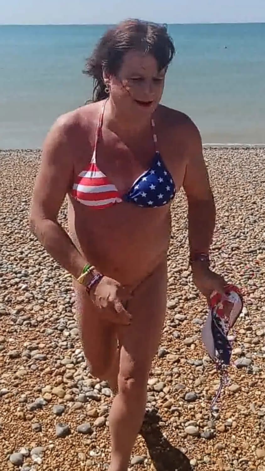 Click to view full size Bottoms off on Brighton nude beach