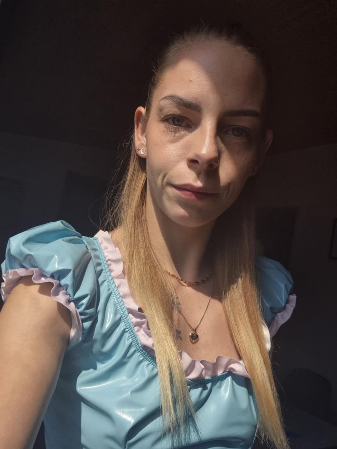 GF in baby blue vinyl dress