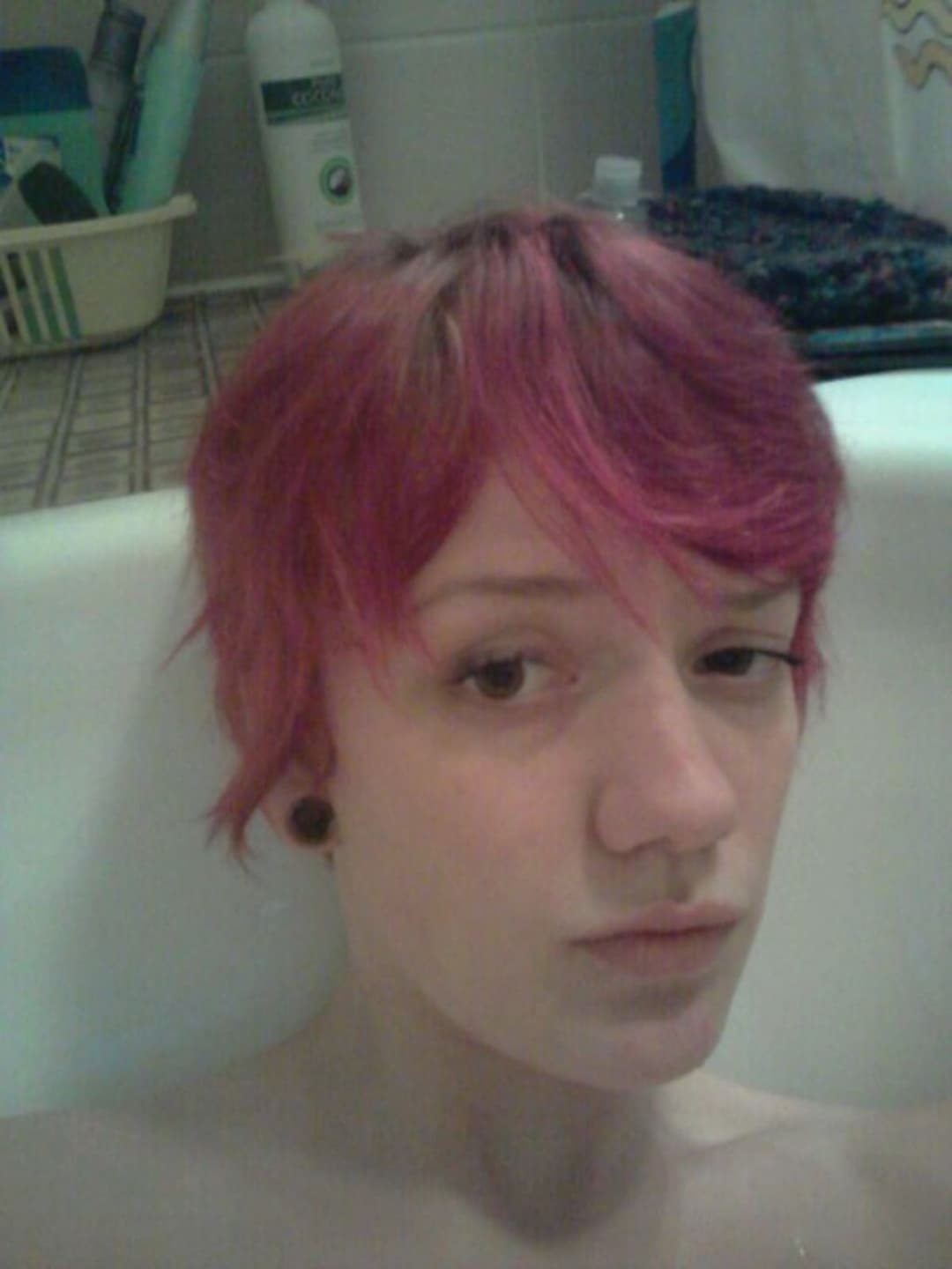 Emo redhead with perky tits teases for the camera