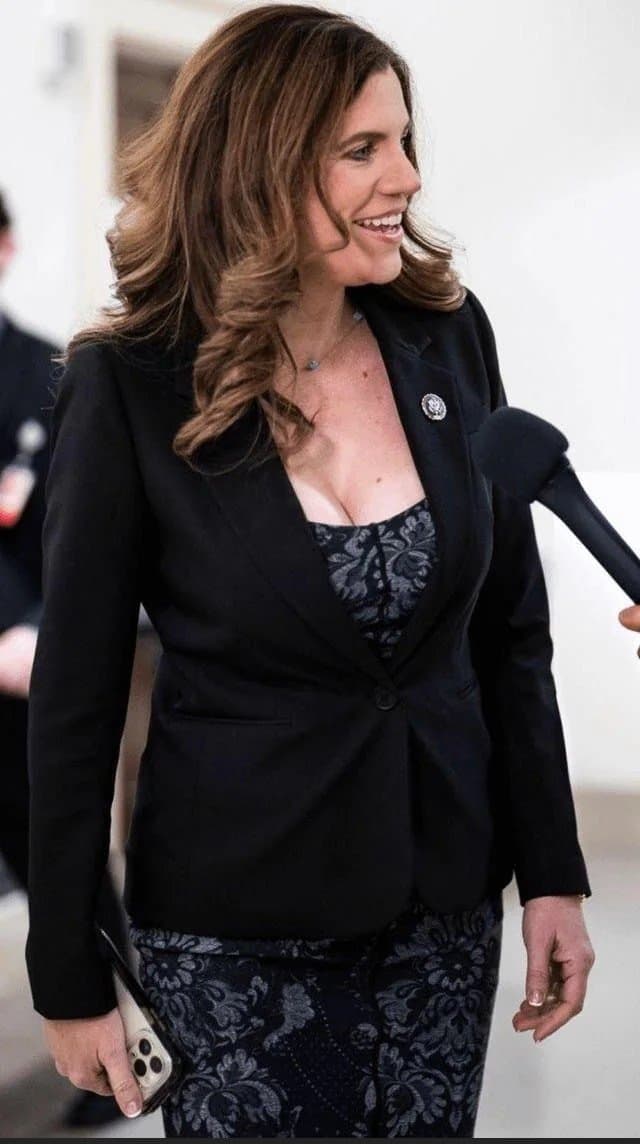 Big titty politician Nancy Mace is a slutty milf.  She needs a cock in her whore big mouth.