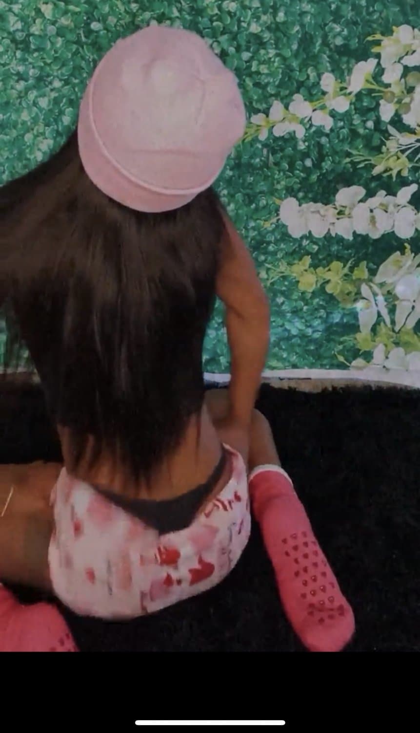 Black girl twerking on the floor with panties peaking out