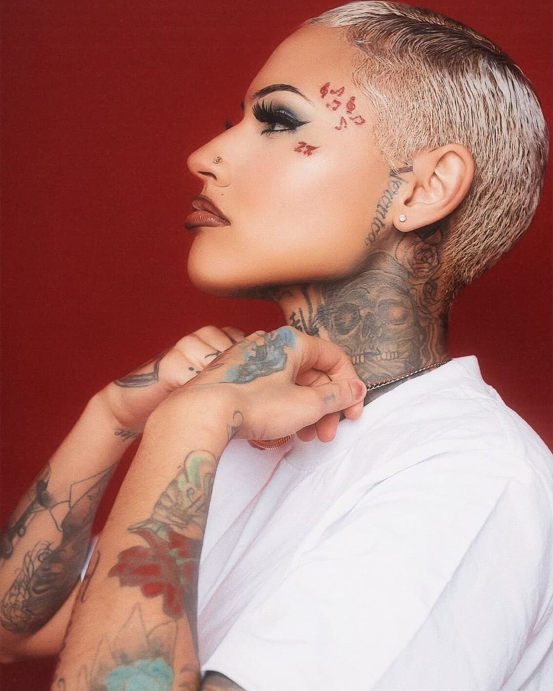 Light skin yellow bone short hair Tatted tomboy buzzcut Thotie rapper