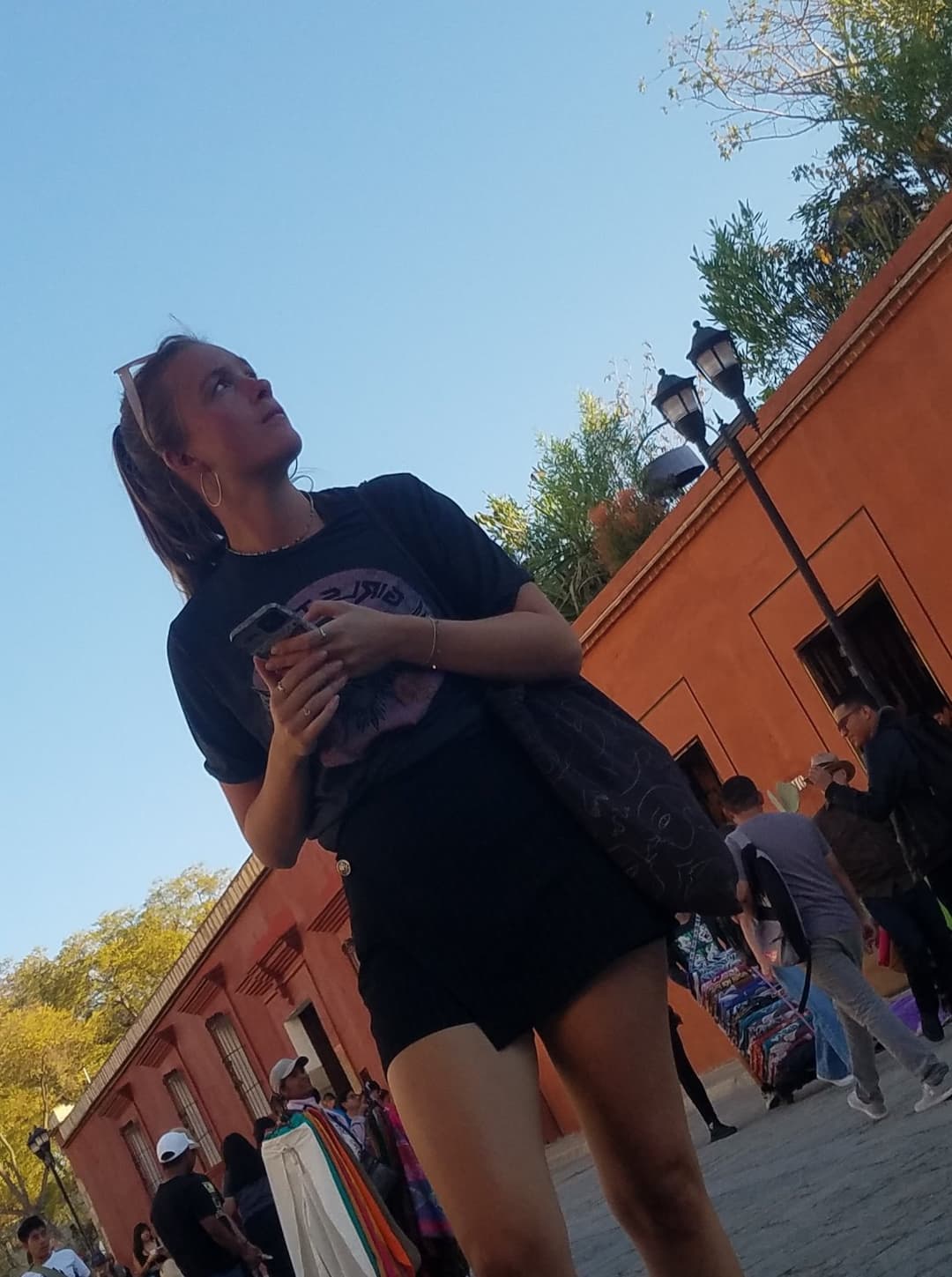 2 friends, blonde and brunette, in shorts, nice legs