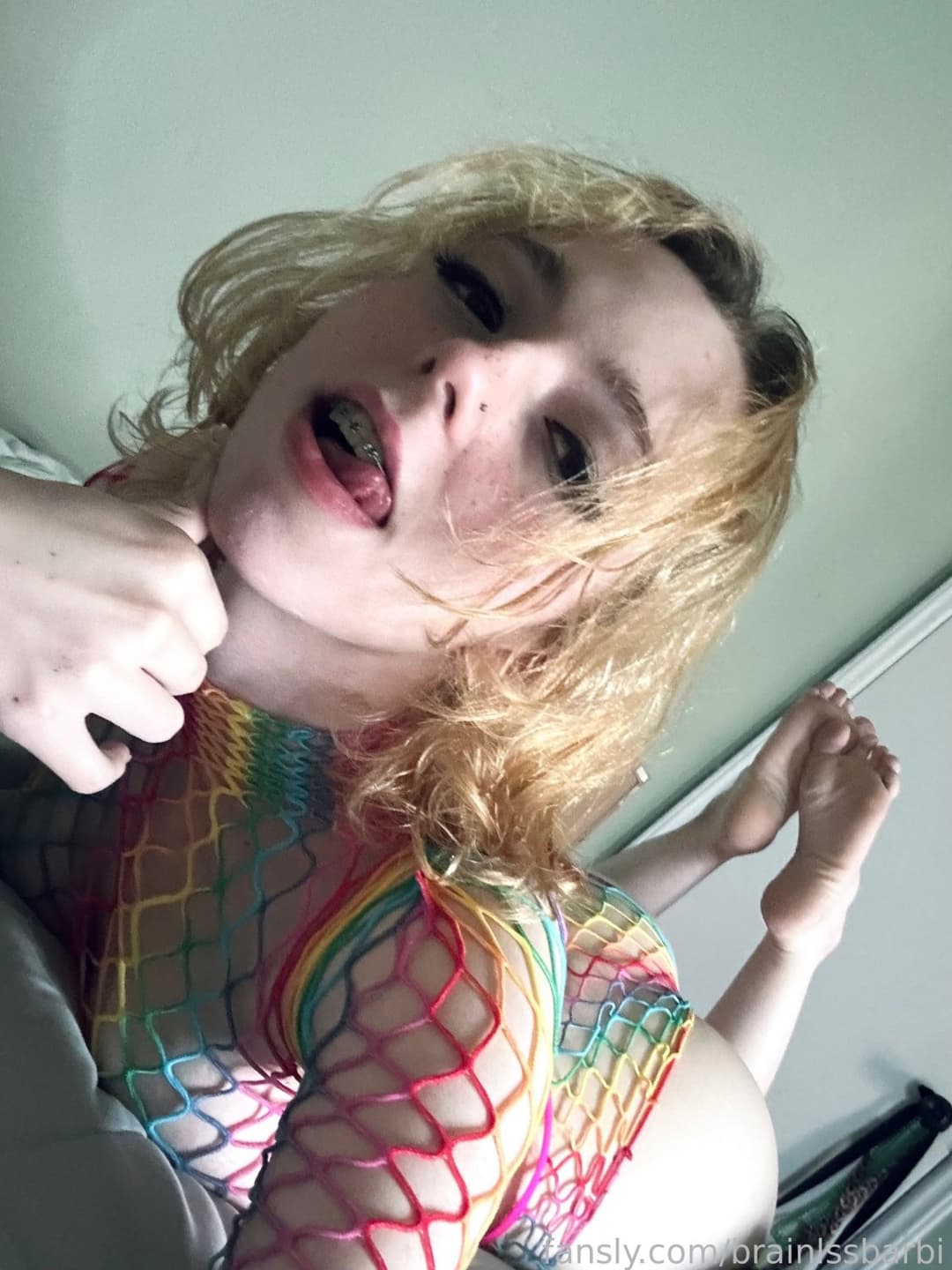 Braces bimbo slut shows feet