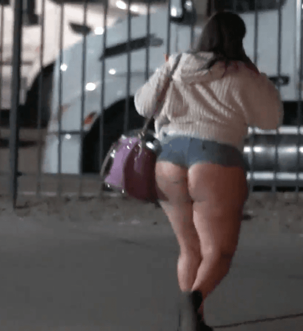 fat cakes latina milf hooker smoking cigarette jean shorts