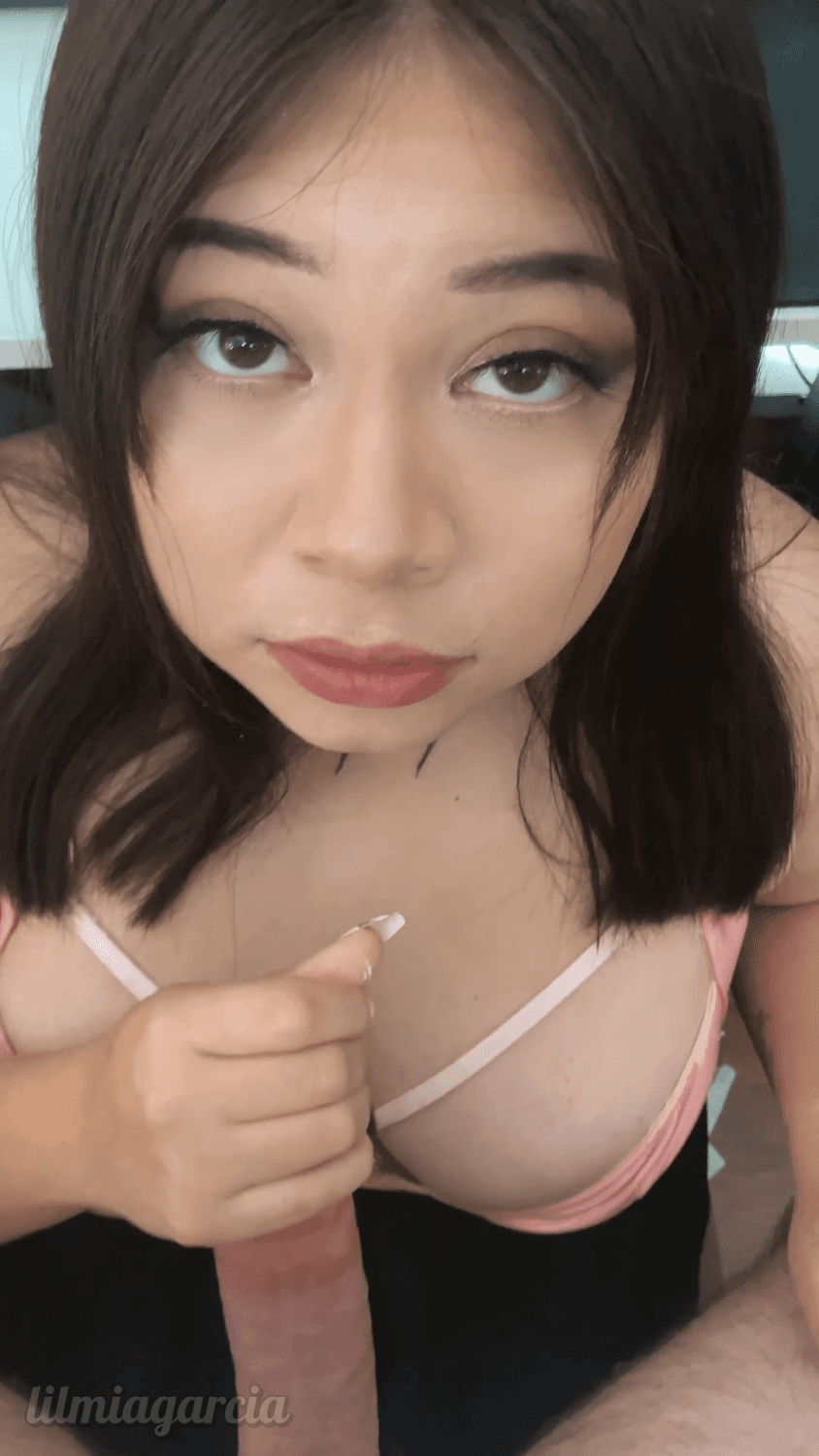 Cute Latina gives a sensual handjob to her friend