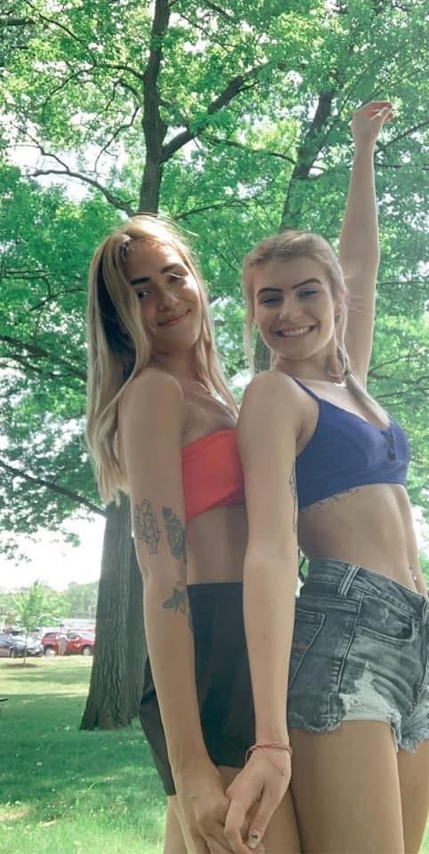 Hot Girls always go for the mean guys. Biker guy was making out with both of them as they strokedhim