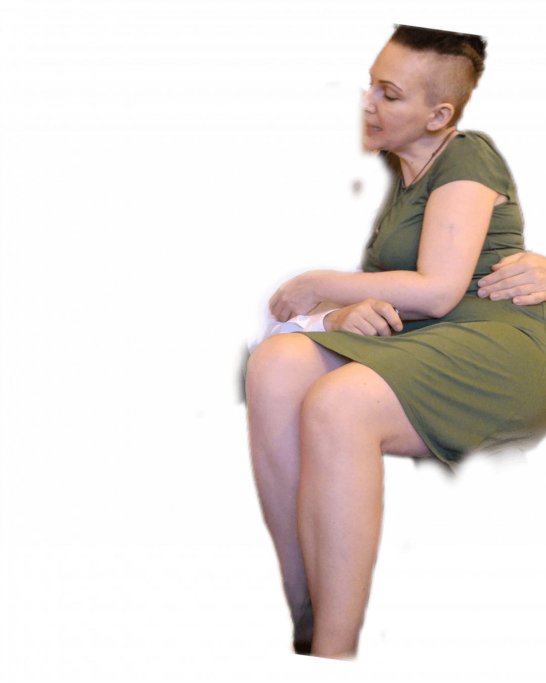 Click to view full size Very pretty MILF spreads her legs on the sofa.