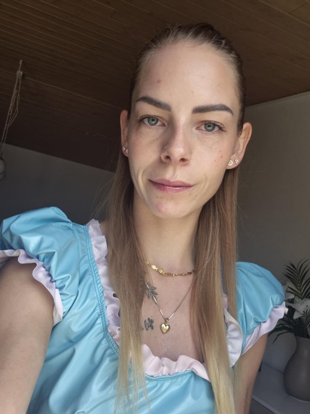 GF in baby blue vinyl dress