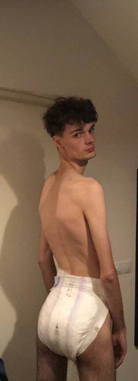 Click to view full size Silly boy in a diaper.