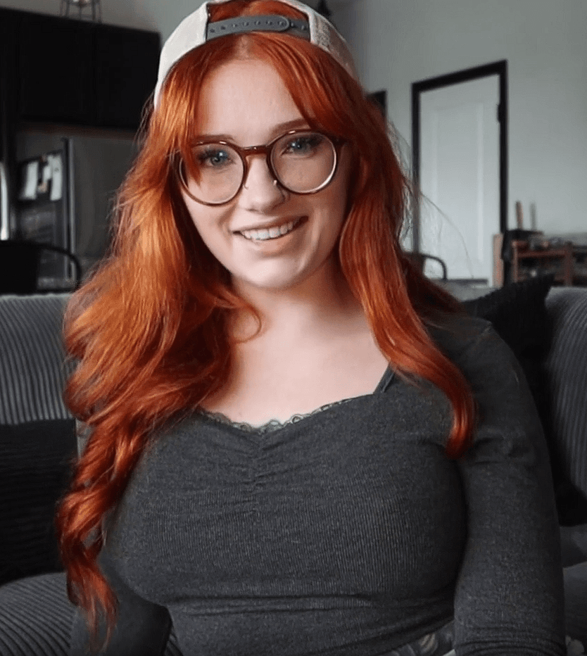 horny redhead in glasses seducing bbc to have sex and facial