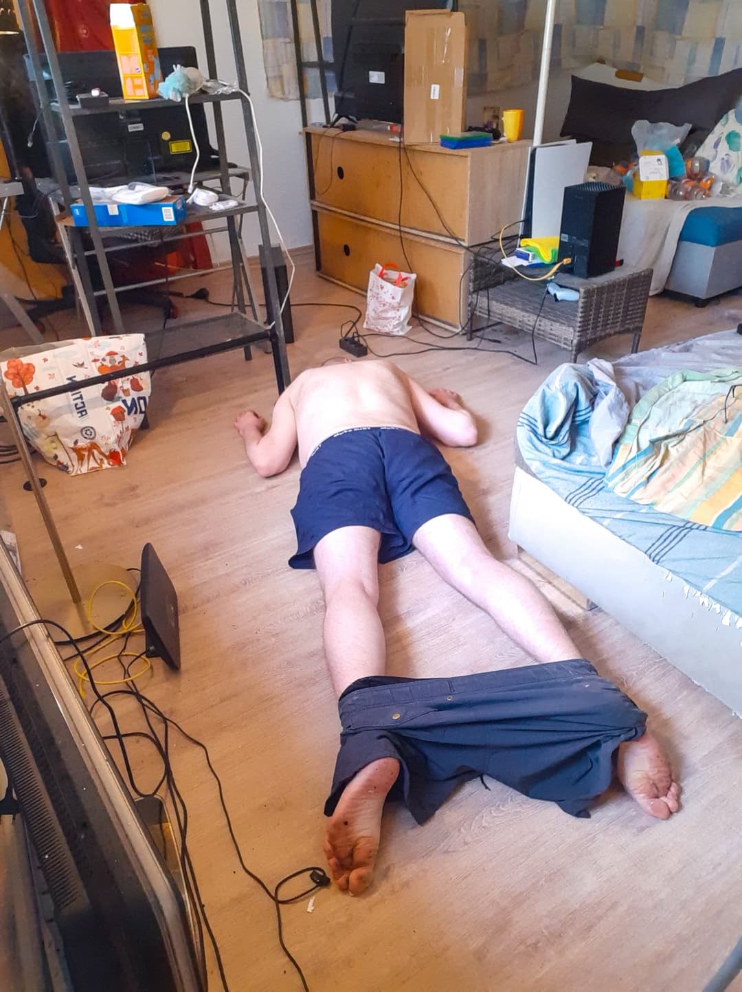 Naked male virgin beaten unconscious in front of people and filmed twitching