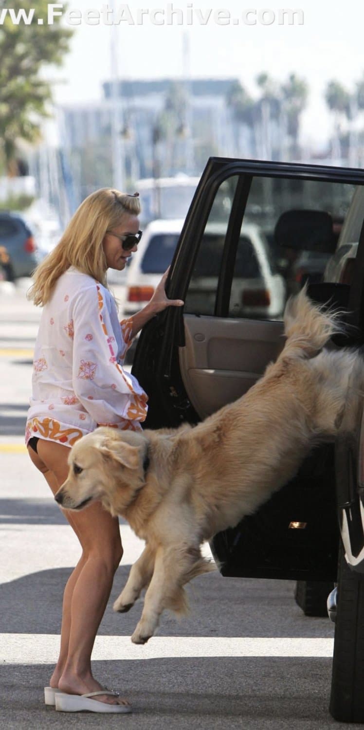 Nicollette Sheridan in platform flip flops