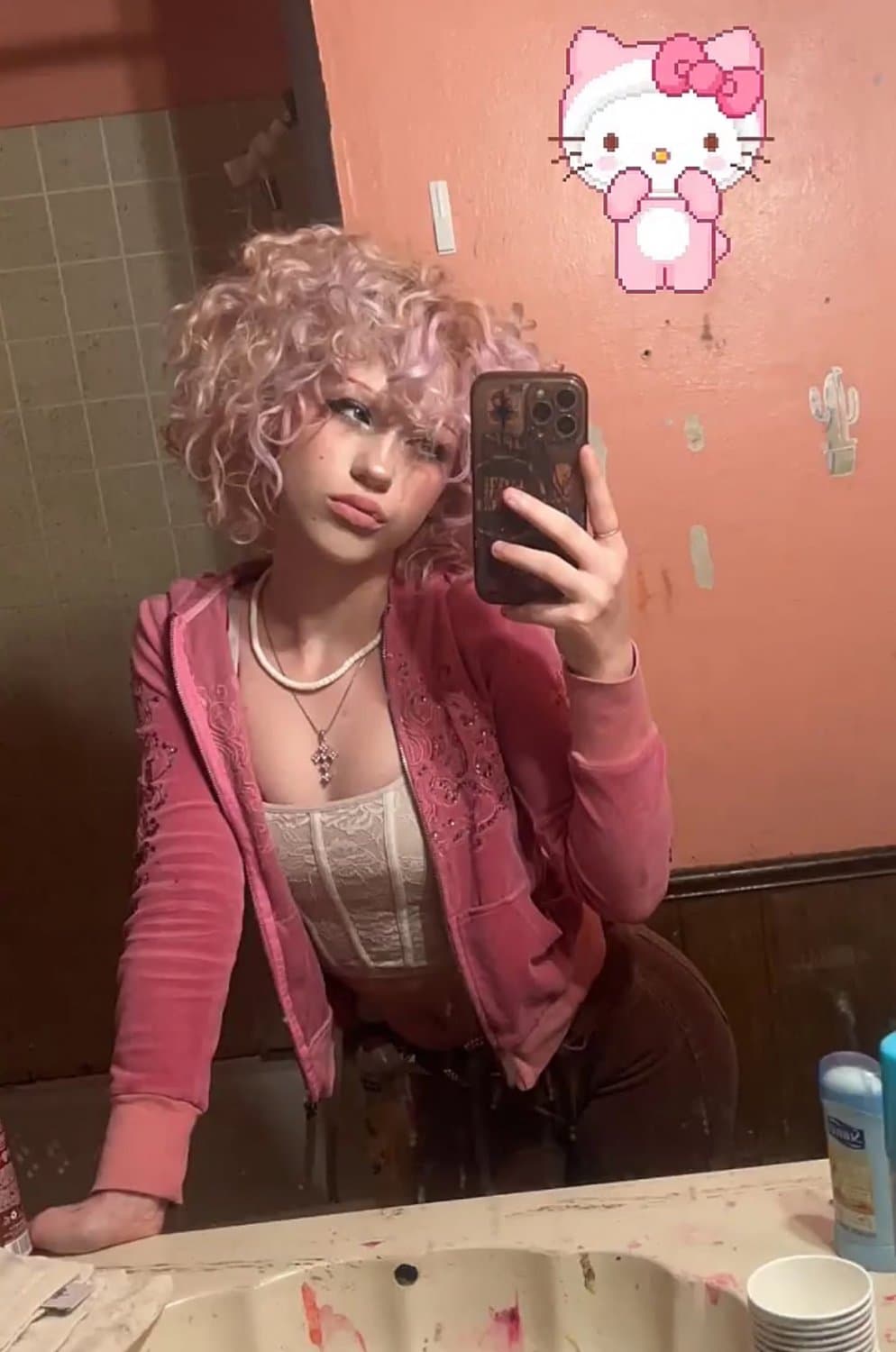 pink haired emo girl arches and shows ass