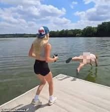 OF model influencer pays crazy lady $20 to jump into lake, almost gets her killed
