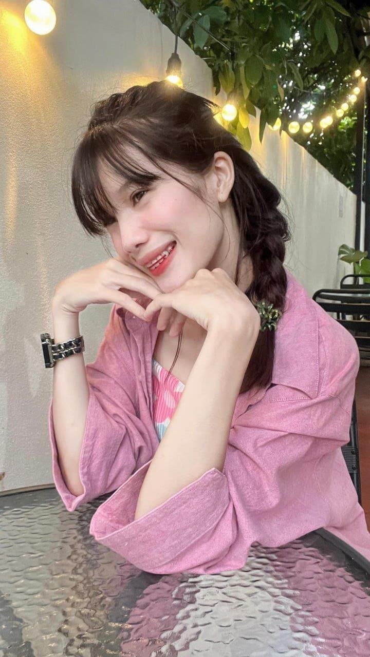 She has a very beautiful and charming smile.