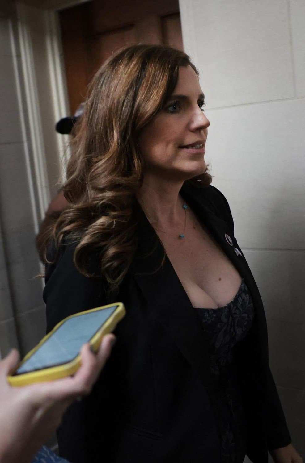 Big titty politician Nancy Mace is a slutty milf.  She needs a cock in her whore big mouth.