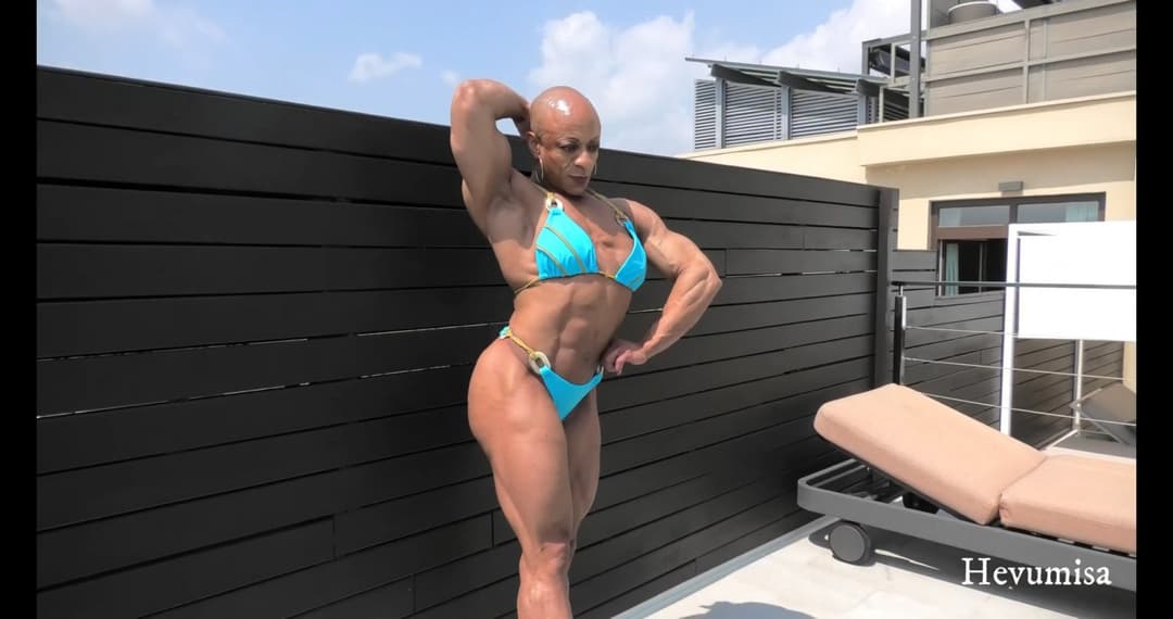 Mrs Menage, just smelling her own roided muscles gives her a powerful orgasm