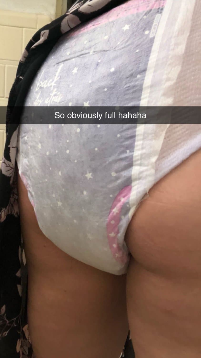 Incontinent college girl doesn’t mind showing off her diapers