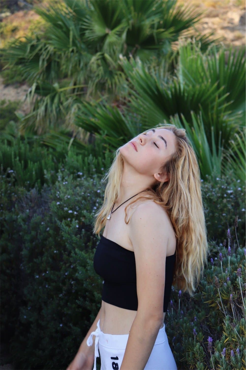 Blonde German slut with black pubes