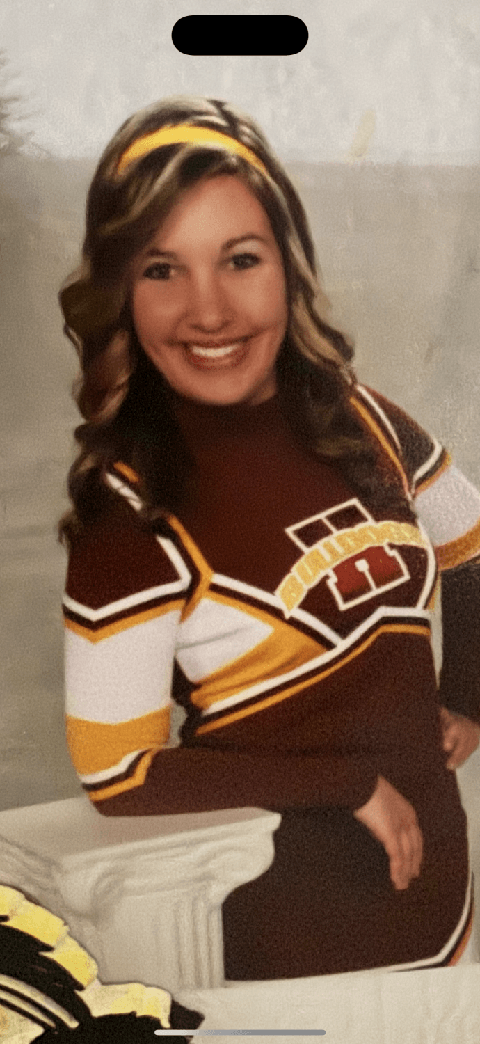 What school did she cheer for? Trying to figure it out. Sexy slut. Also a local pageant queen. Name?