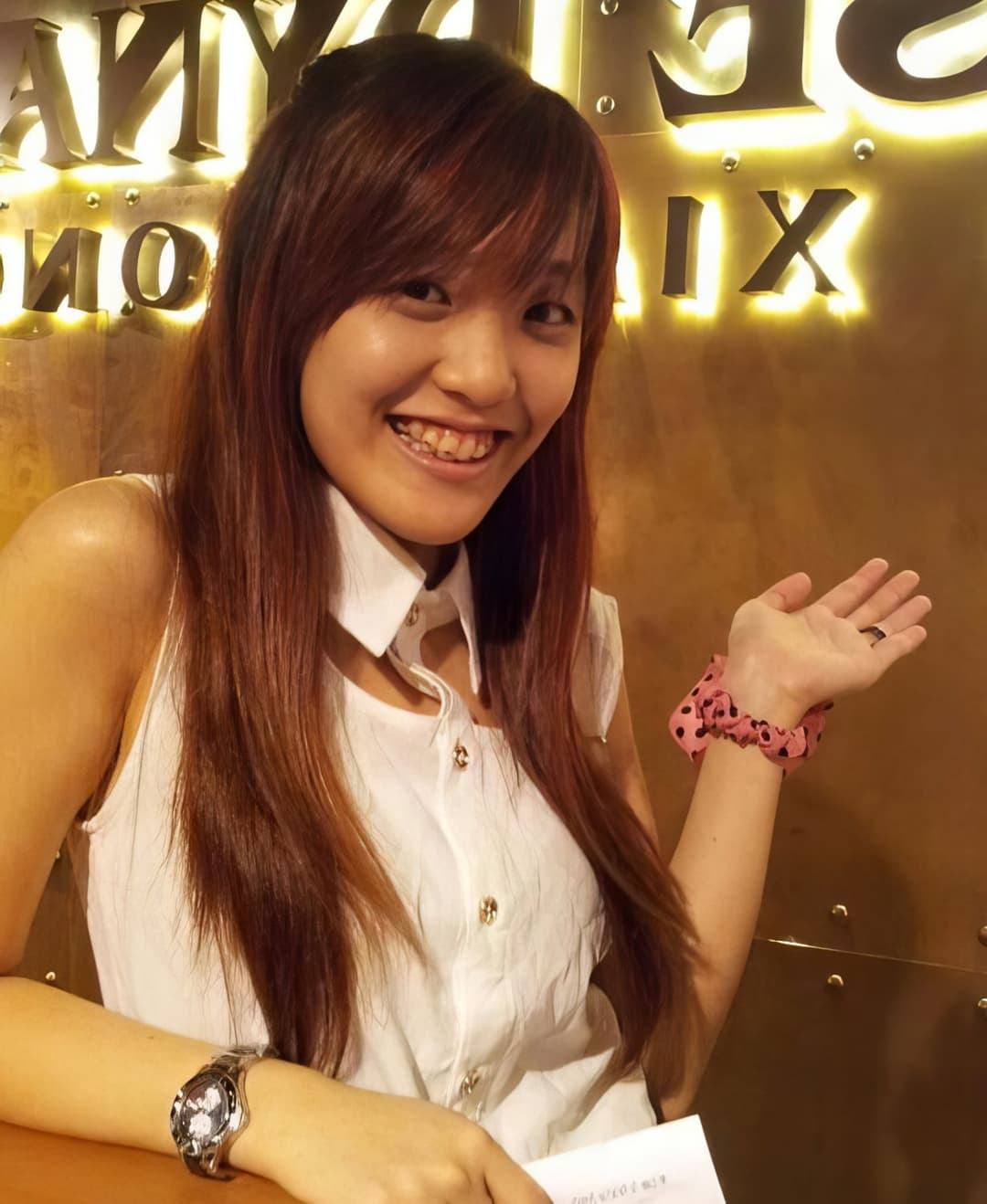 Cute HongKong slut revealing her boobs