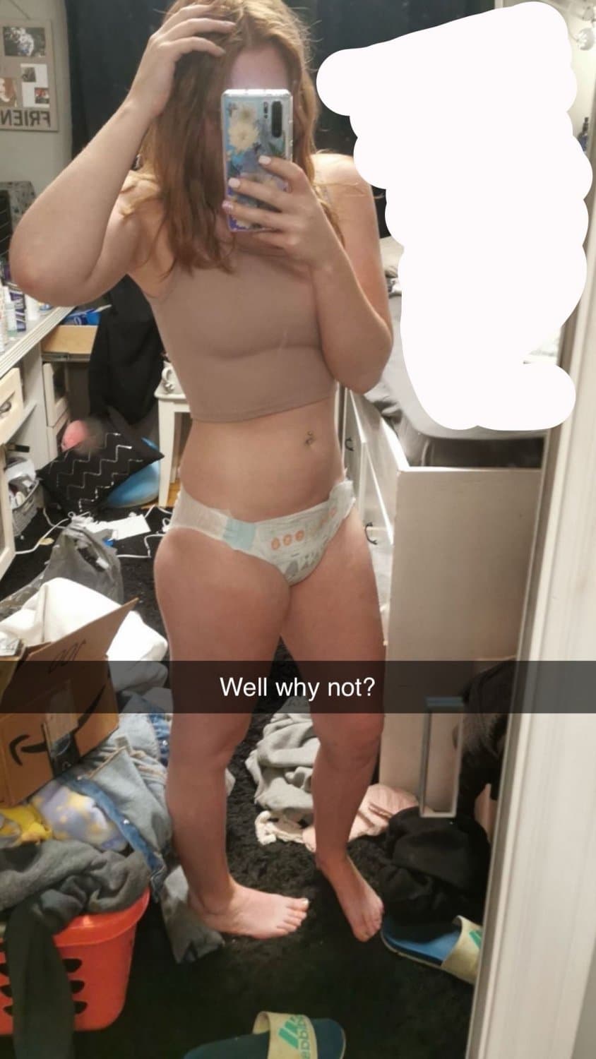 Click to view full size Cute redhead wears diapers for “anxiety”
