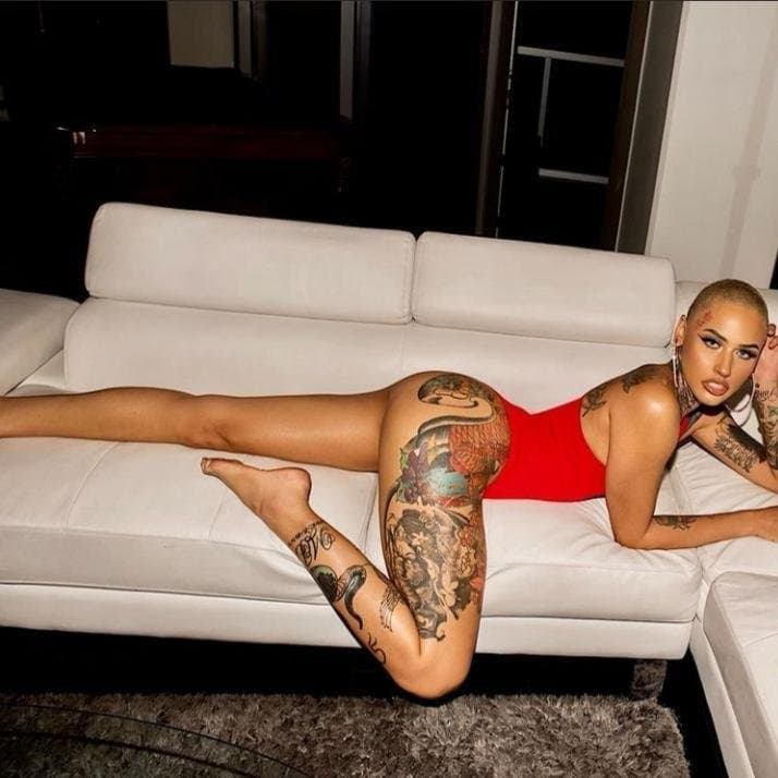 Light skin yellow bone short hair Tatted tomboy buzzcut Thotie rapper