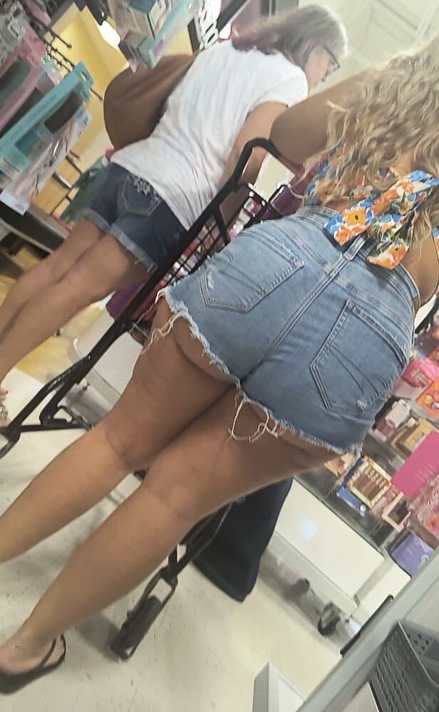 Thick Blonde Cheeks Hanging Out Her Shorts