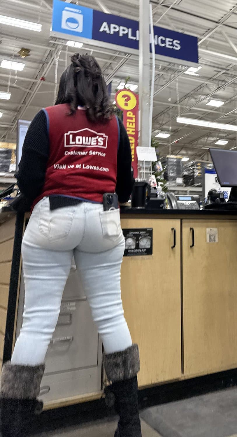 Sexy Jamaican milf worker shows off huge ass in tight jeans