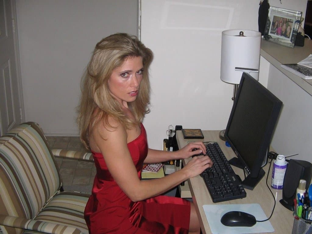 Blonde hottie wears a collar and leash