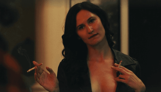 Click to view full size smoking horror hottie from horror movie A