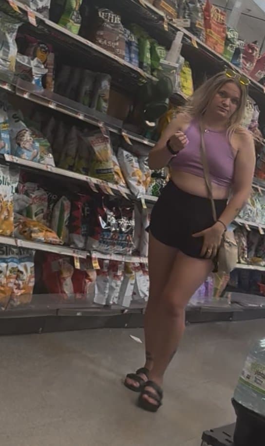 blonde irl wearing pink panties under her shorts