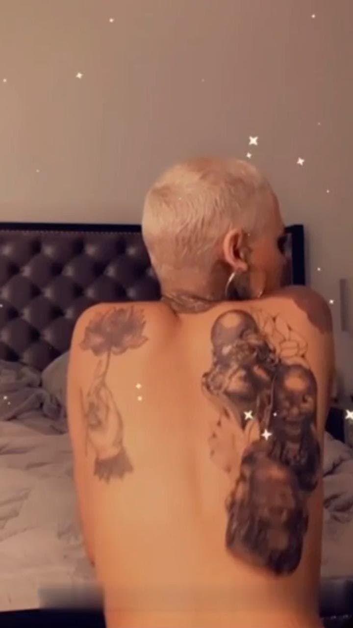 Light skin yellow bone short hair Tatted tomboy buzzcut Thotie rapper