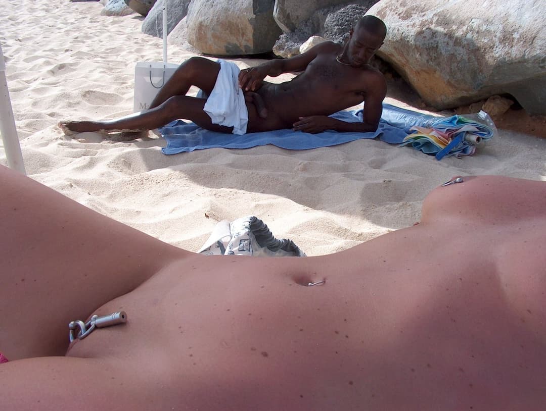 Amateur flasher with cunt piercings