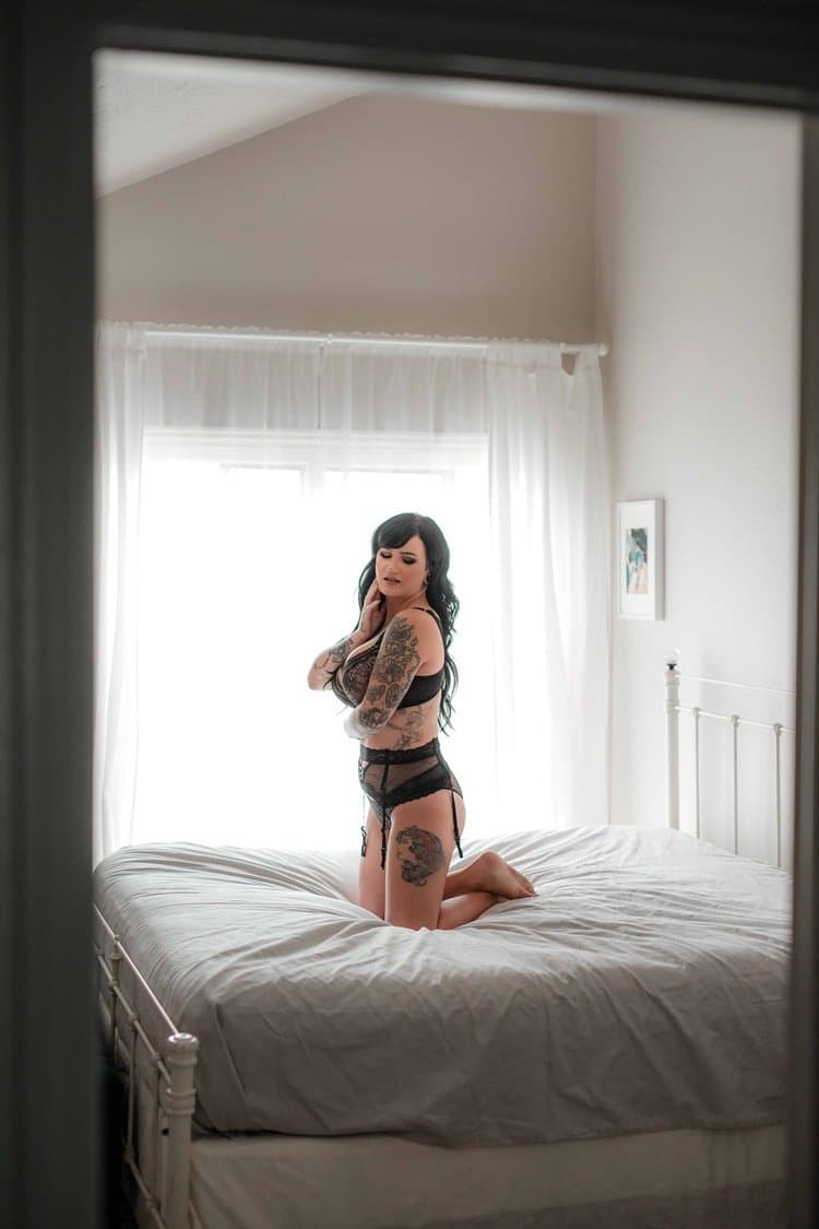 Tatted busty black hair beauty boudoir