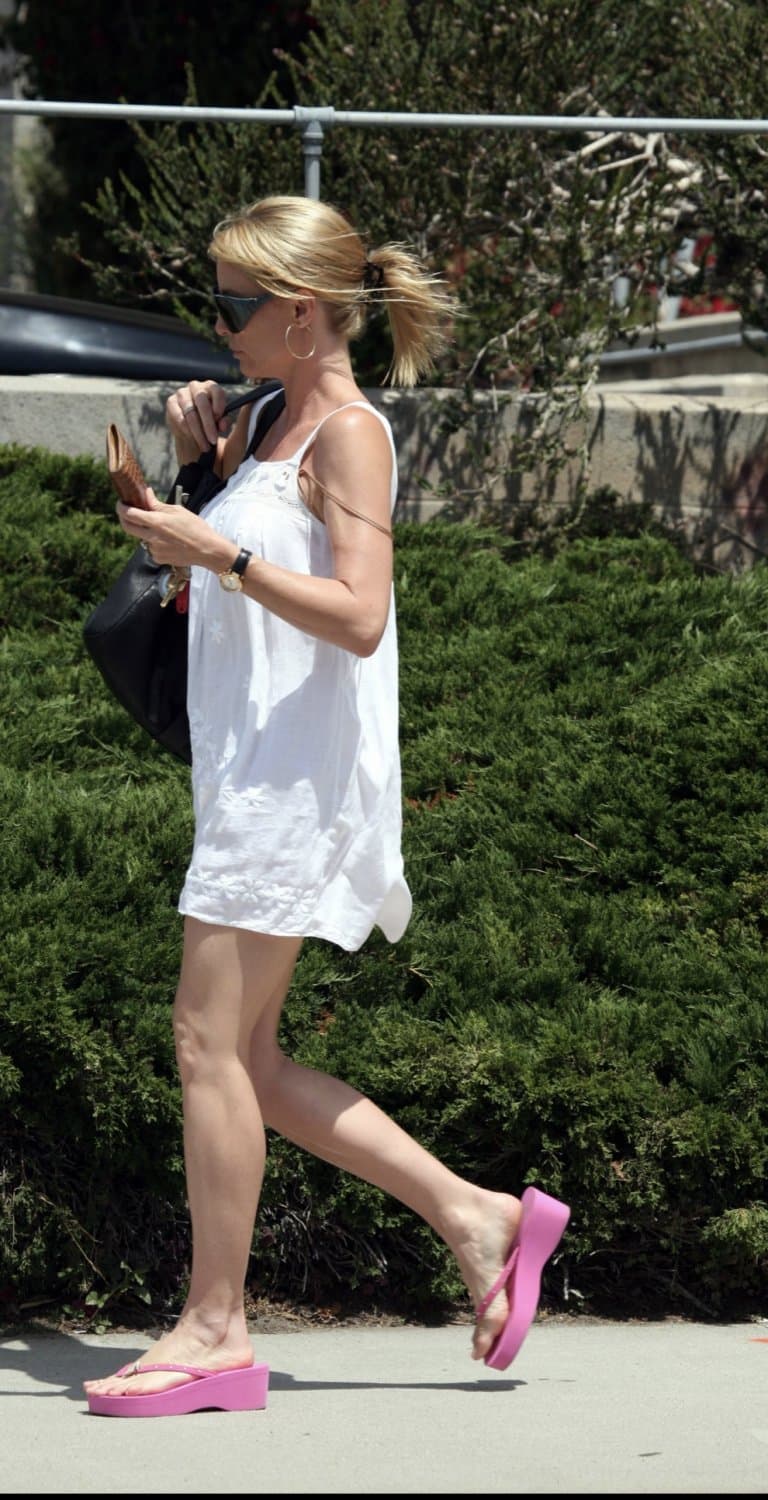 Nicollette Sheridan in platform flip flops