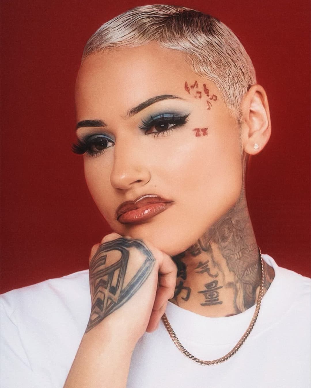Light skin yellow bone short hair Tatted tomboy buzzcut Thotie rapper