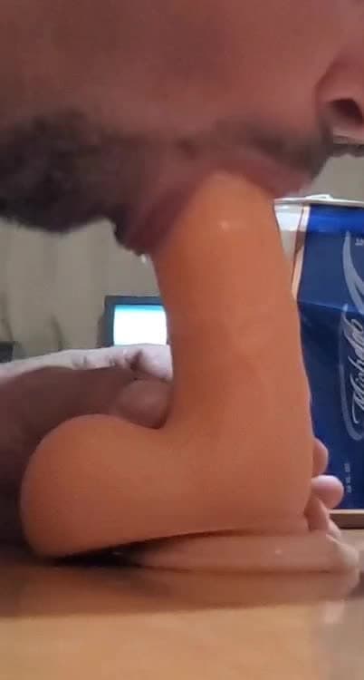 Practice sucking 8 inch dildo