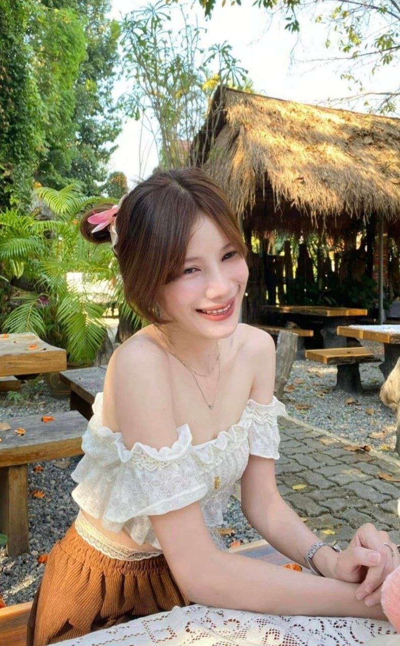 She has a very beautiful and charming smile.