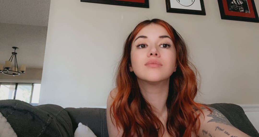 Click to view full size Hottest Milf ever? This curvy slut who loves sticking her tongue out comes damn close