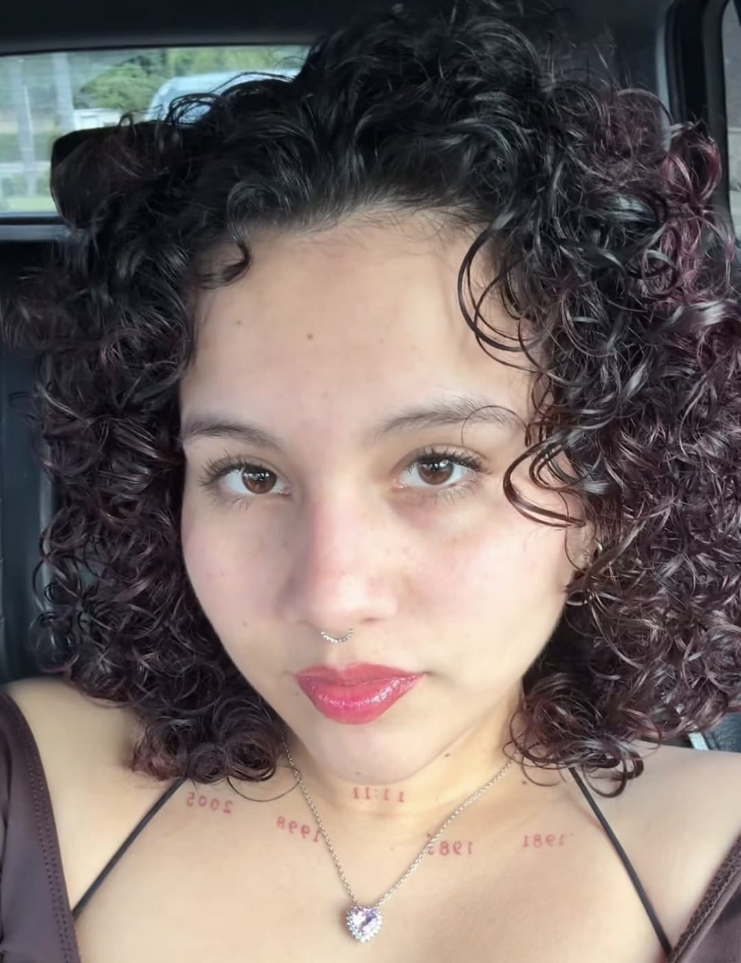 tattoed latina with curly red hair twerks fat ass