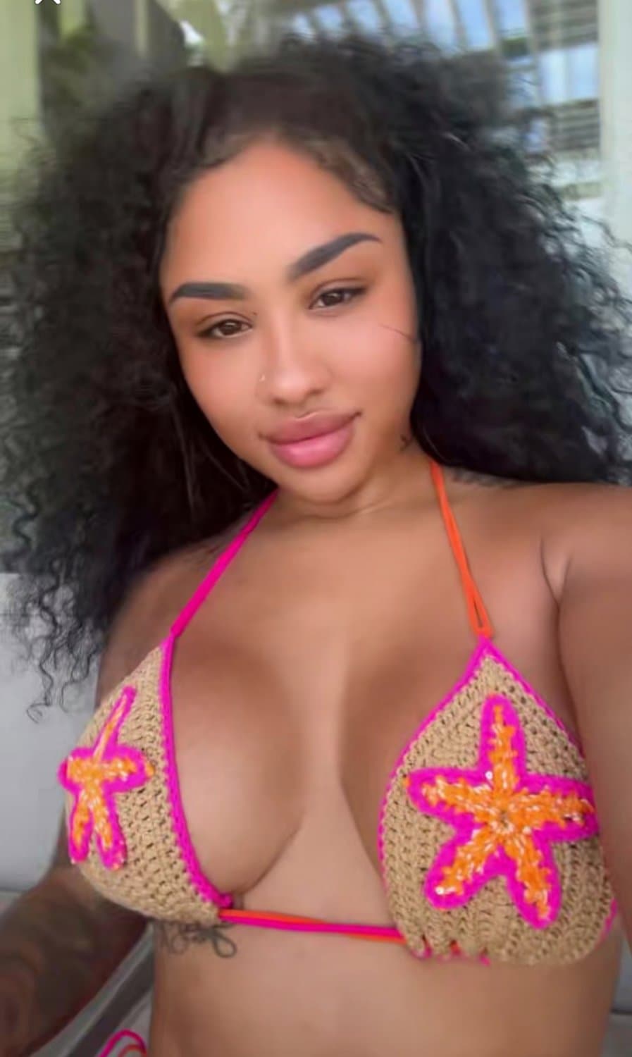 ari fletcher tits busting out bikinis