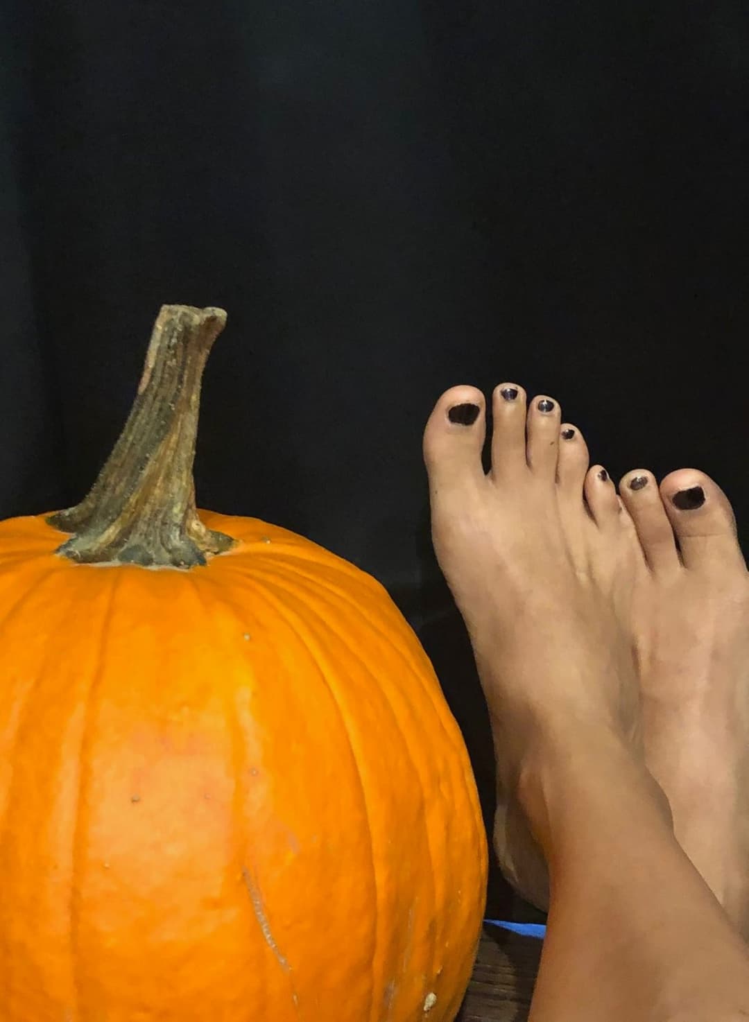 Trick? Treat? Or just a tease with a pumpkin at my feet?