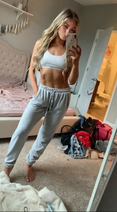 Click to view full size Brenna - perfect fitness slut with piercings showing off