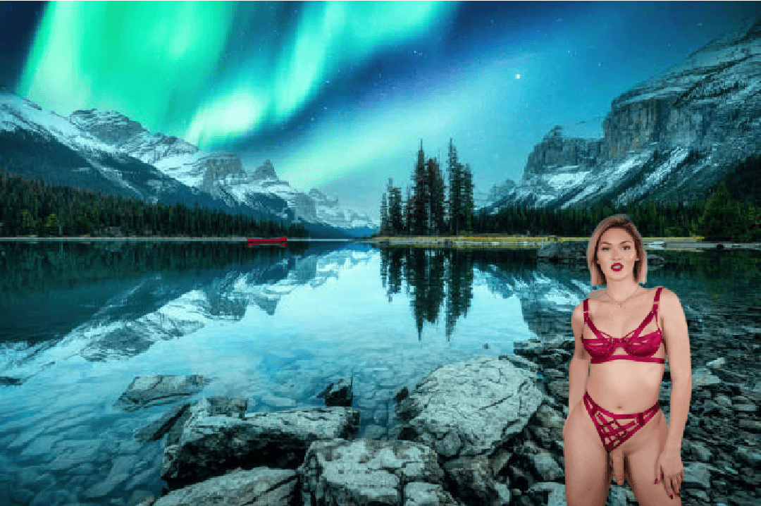 Blonde TS Tori Easton Under Aurora Borealis On Spirit Island Along Maligne Lake In The Yukon