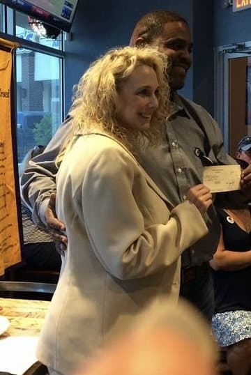 Cast your vote for the best tits at Mardi Gras from this busty j u d g e!