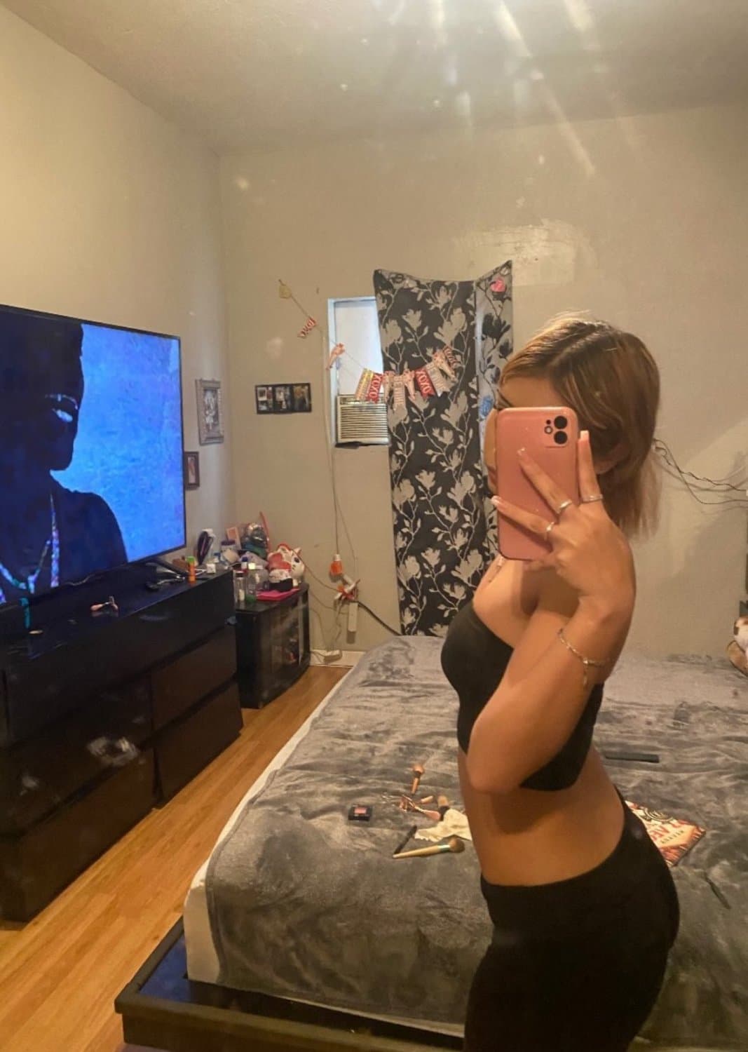 Horny Latina shows off her perky tits